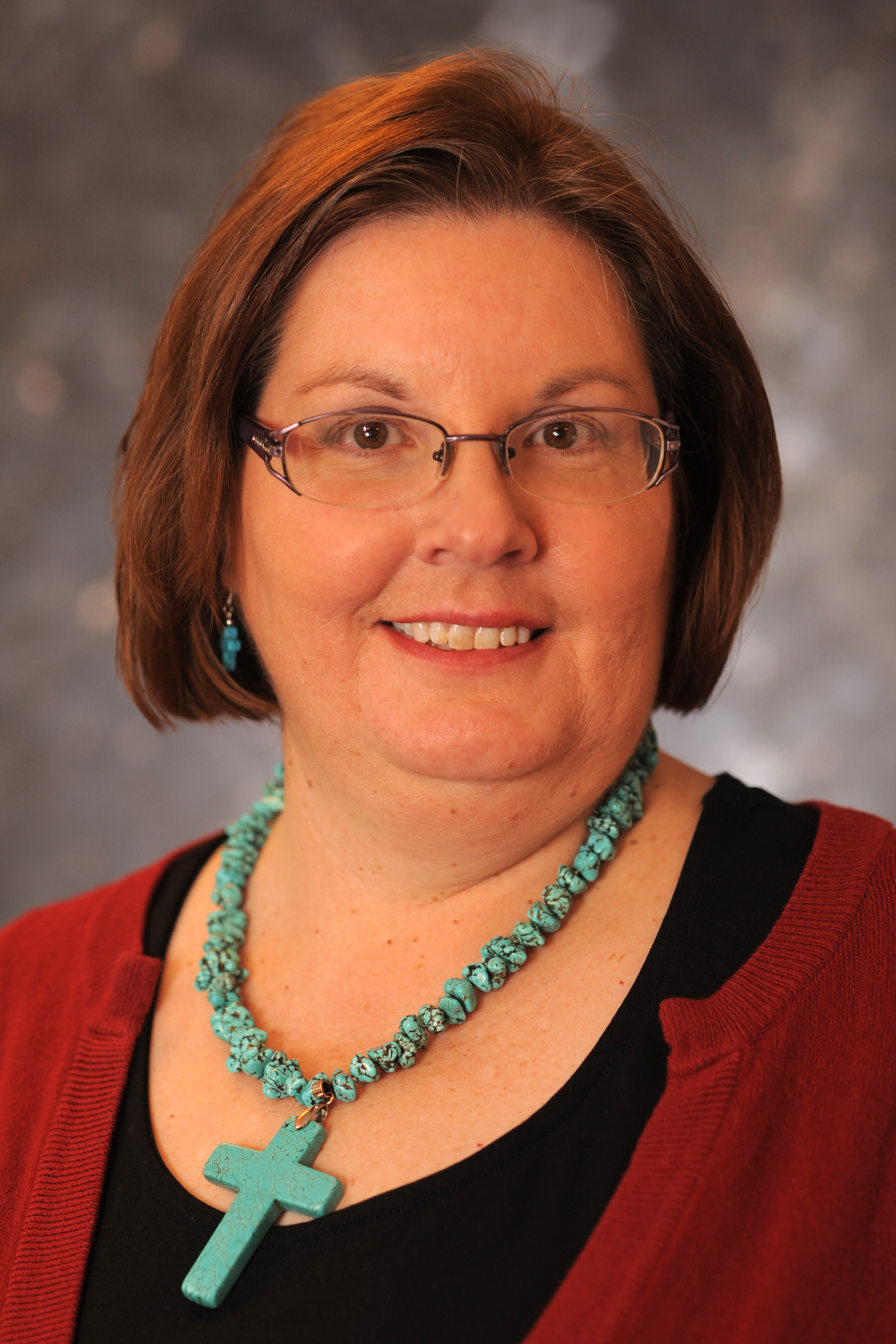 A headshot of a woman