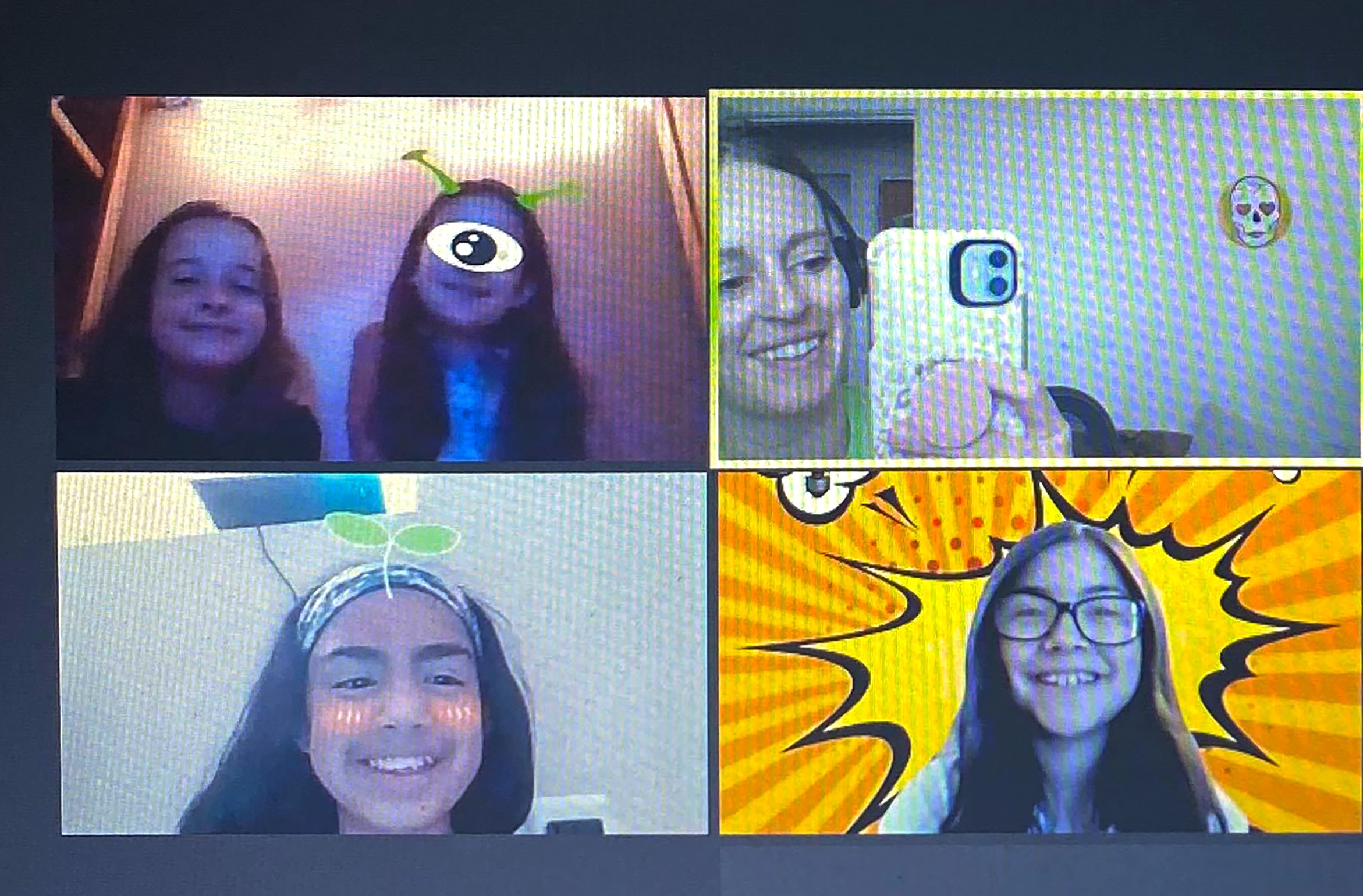 Children participating in a Zoom workshop