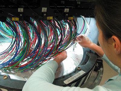 man working on wires