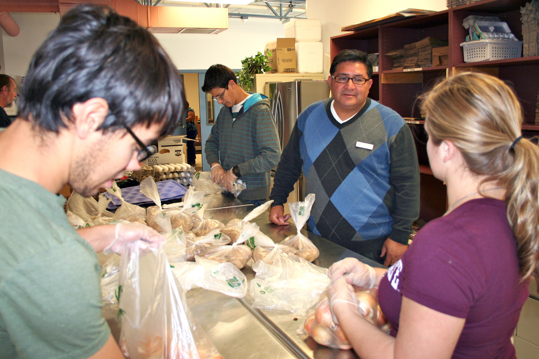 Volunteers sorting food