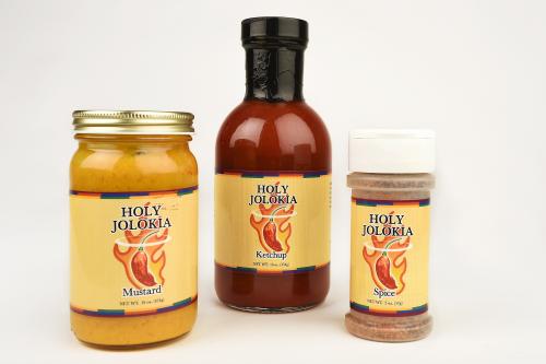New and super spicy Holy Jolokia mustard, ketchup and spice mixture, each produced in collaboration with CaJohns Fiery Foods.