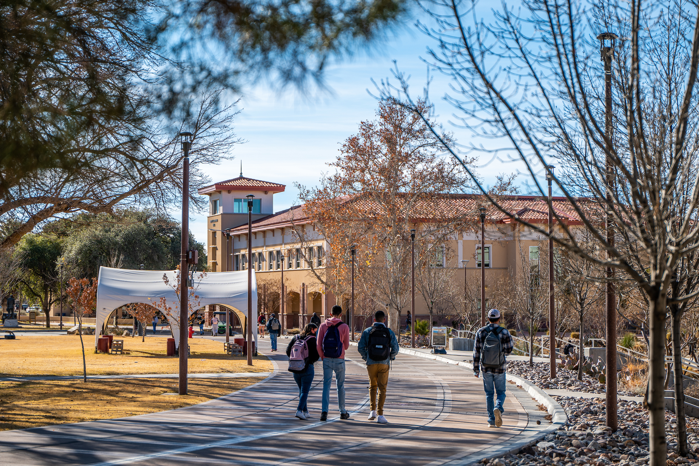 Students walk on NMSU’s campus 