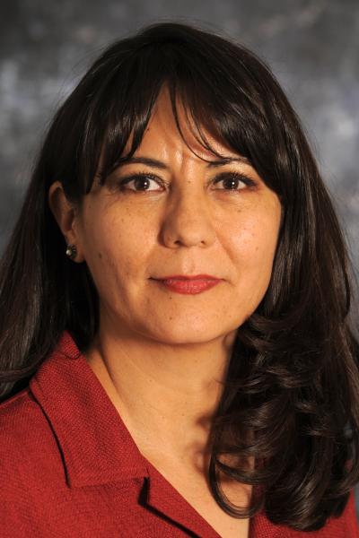 head shot woman in red blouse