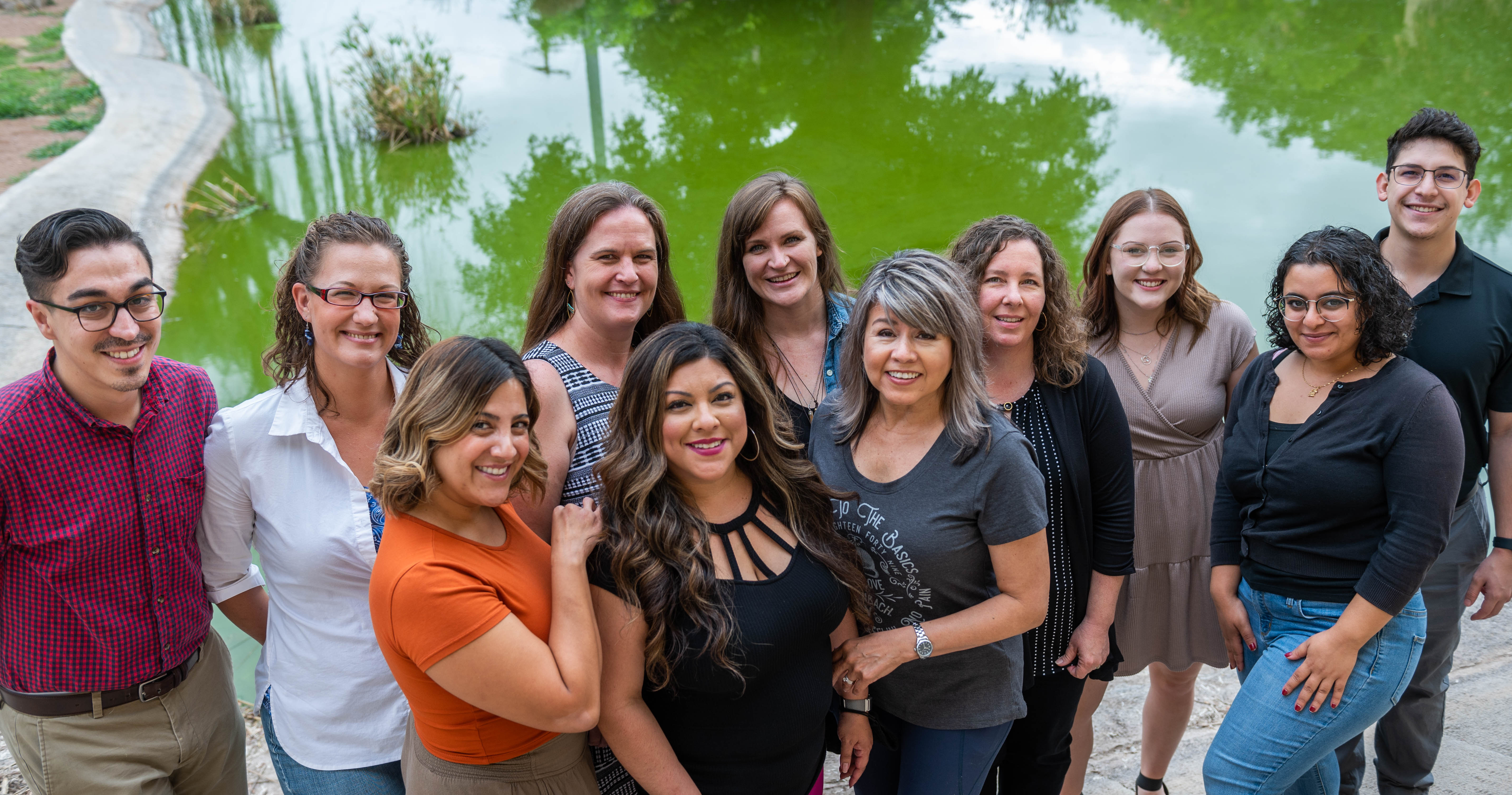 Staff members from the Center of Innovation for Behavioral Health and Wellbeing at NMSU. From left, Jesus Romero, Allison Boyce, Priscila Solis, Brooke Stanley Tou, who serves as the center's director, Lorretta Diaz, Liz Bennett, Mary Ortaleza, Sandra Gallegos, Alana Hancock, Enas Khaleq and Andrew Maldonado. Staff members not pictured: Bob Brazell, Nancy Patterson, Alexa Copeland, Ana Ginez, and Jessica Chacon.. (NMSU photo by Josh Bachman)