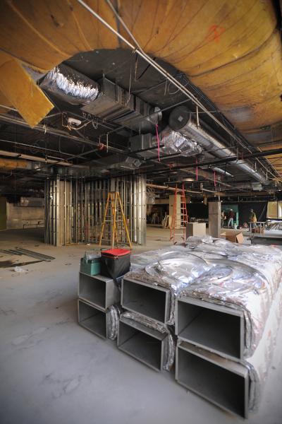 Ducting is stacked on the bare floor on Taos Restaurant in early July. 