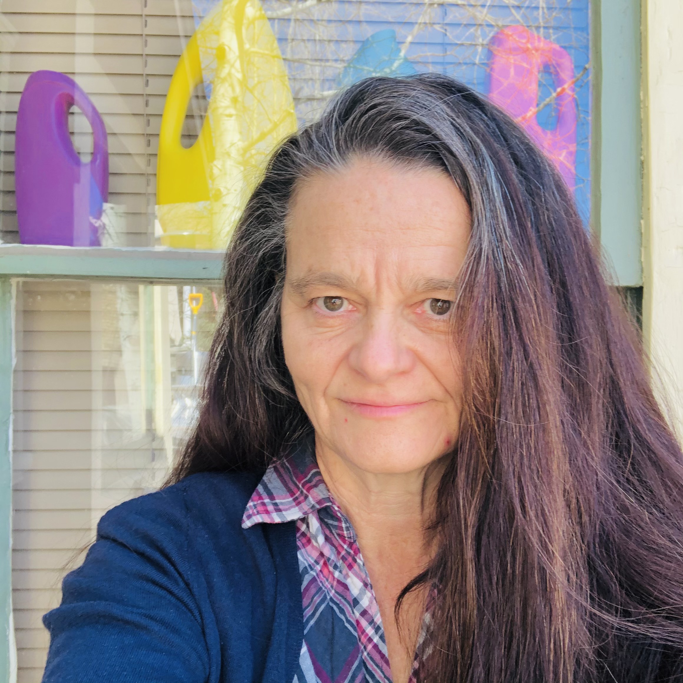 Head and shoulders of woman.